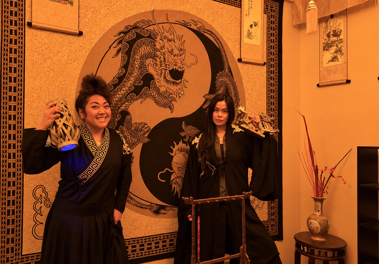 Two Royal Library players posing with their tools